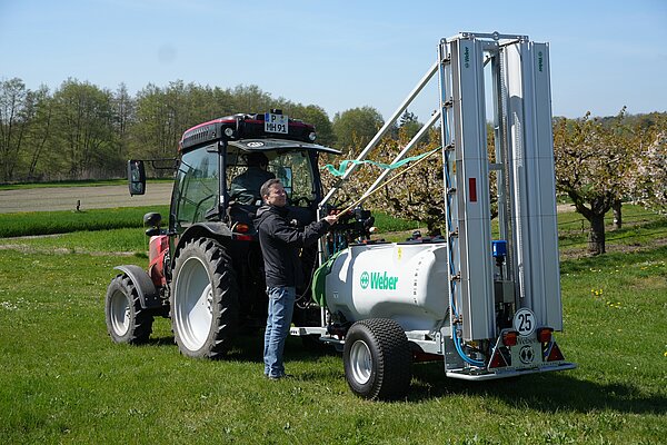 Tractor with a drift-reducing application system